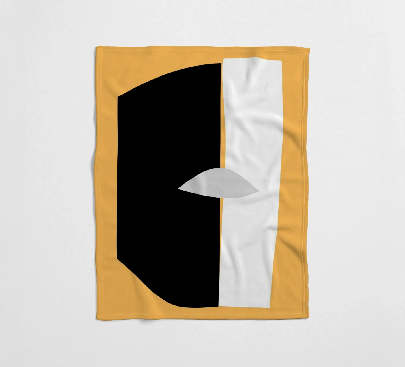 A cut fleece blanket by Little Dean