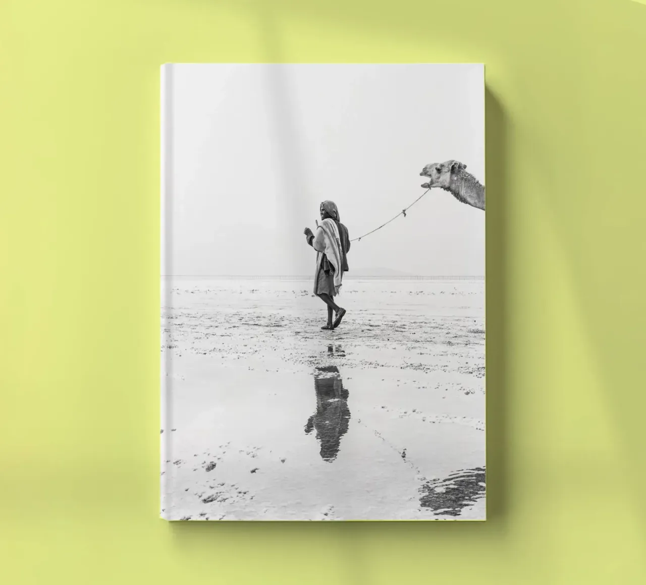 Man with his camel notebook by photolovers