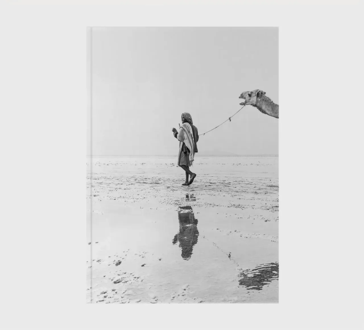 Man with his camel notebook by photolovers