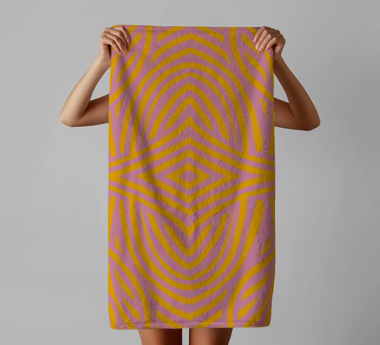 Symmetrical pink and yellow stripe towel by Little Dean