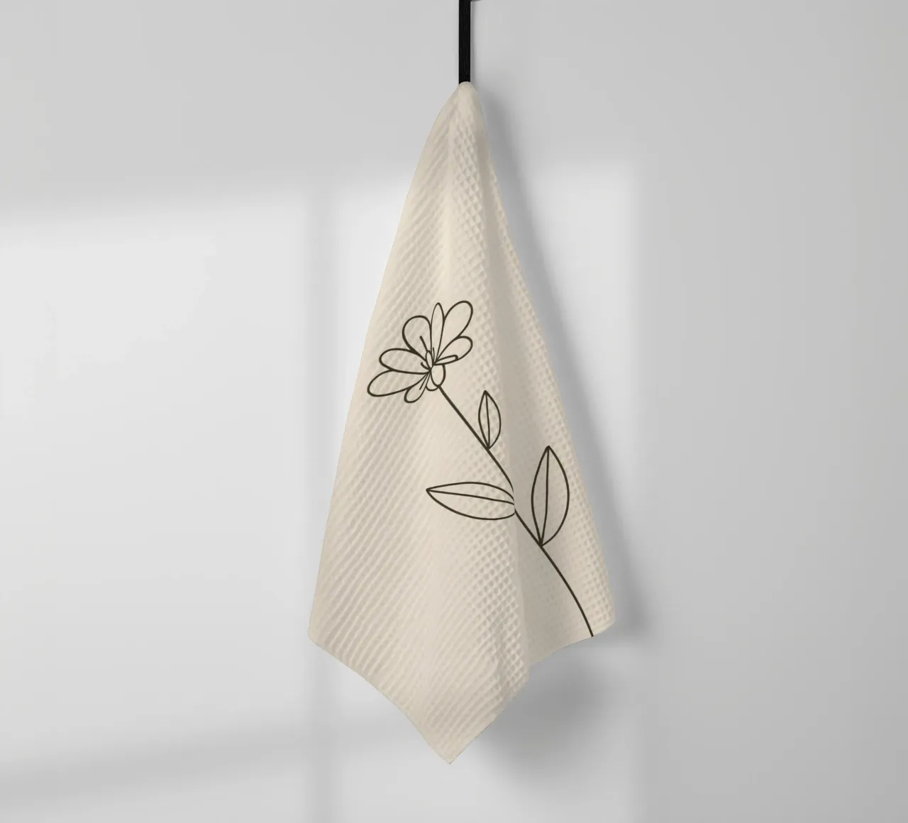 Dessin simple au trait en noir d'une fleur avec des feuilles sur un lampadaire torchon de DesignDoodle
