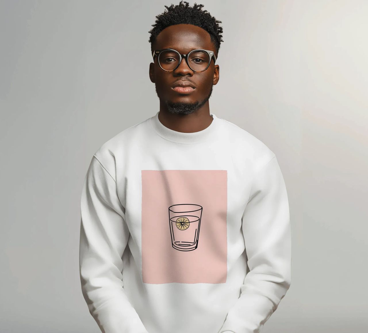 Bevanda rinfrescante in un bicchiere trasparente con una fetta di limone felpa da DesignDoodle