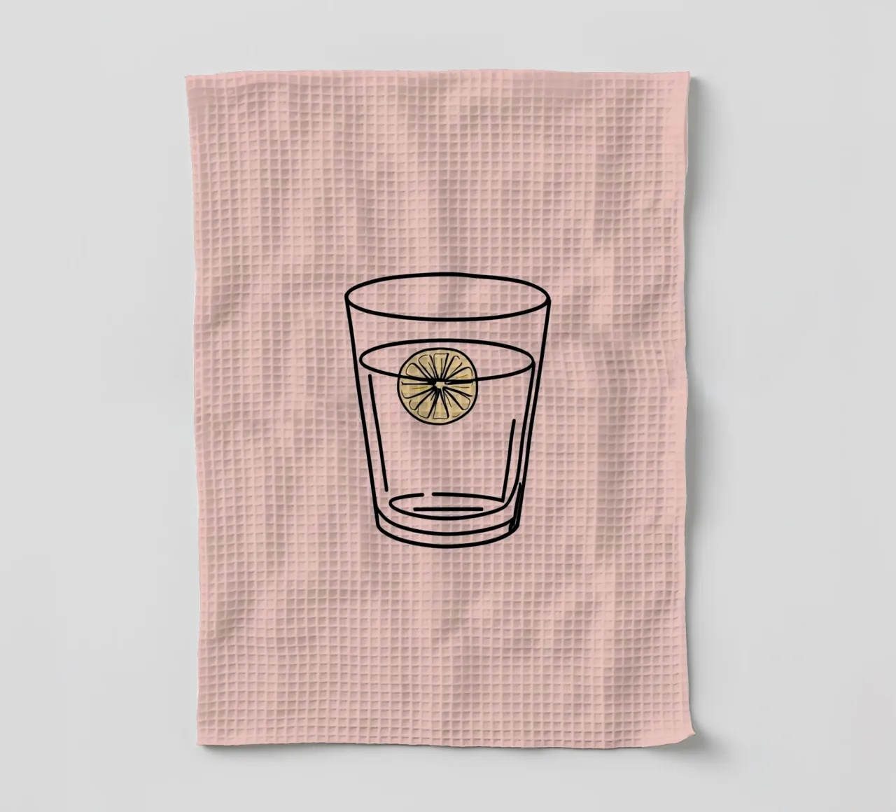 Refreshing drink in a clear glass with a slice of lemon tea towel by DesignDoodle