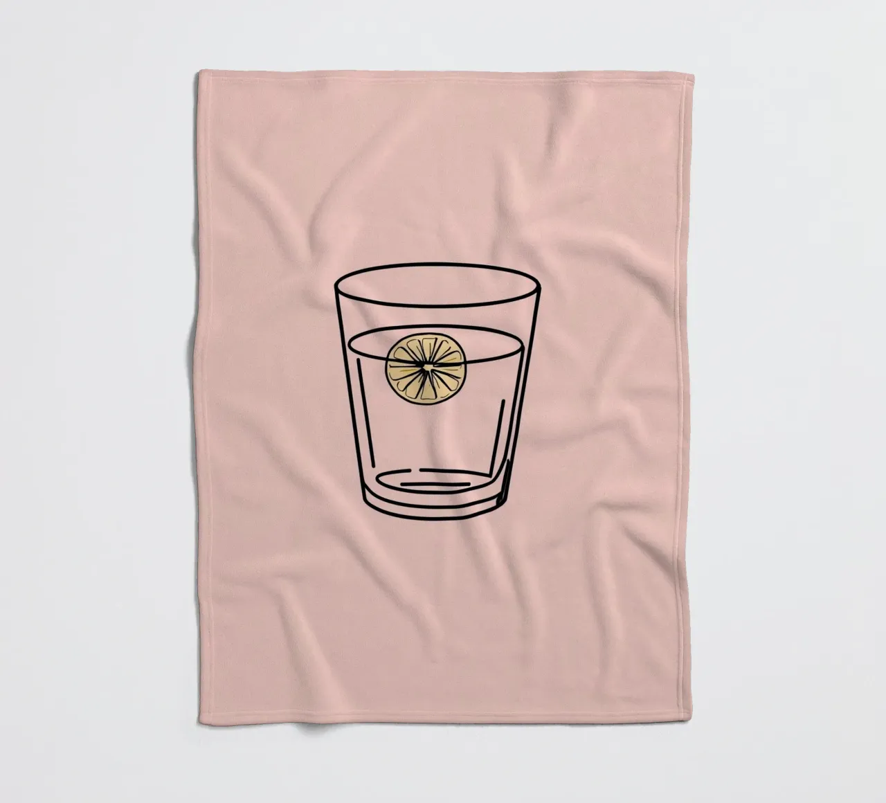 Refreshing drink in a clear glass with a slice of lemon fleece blanket by DesignDoodle