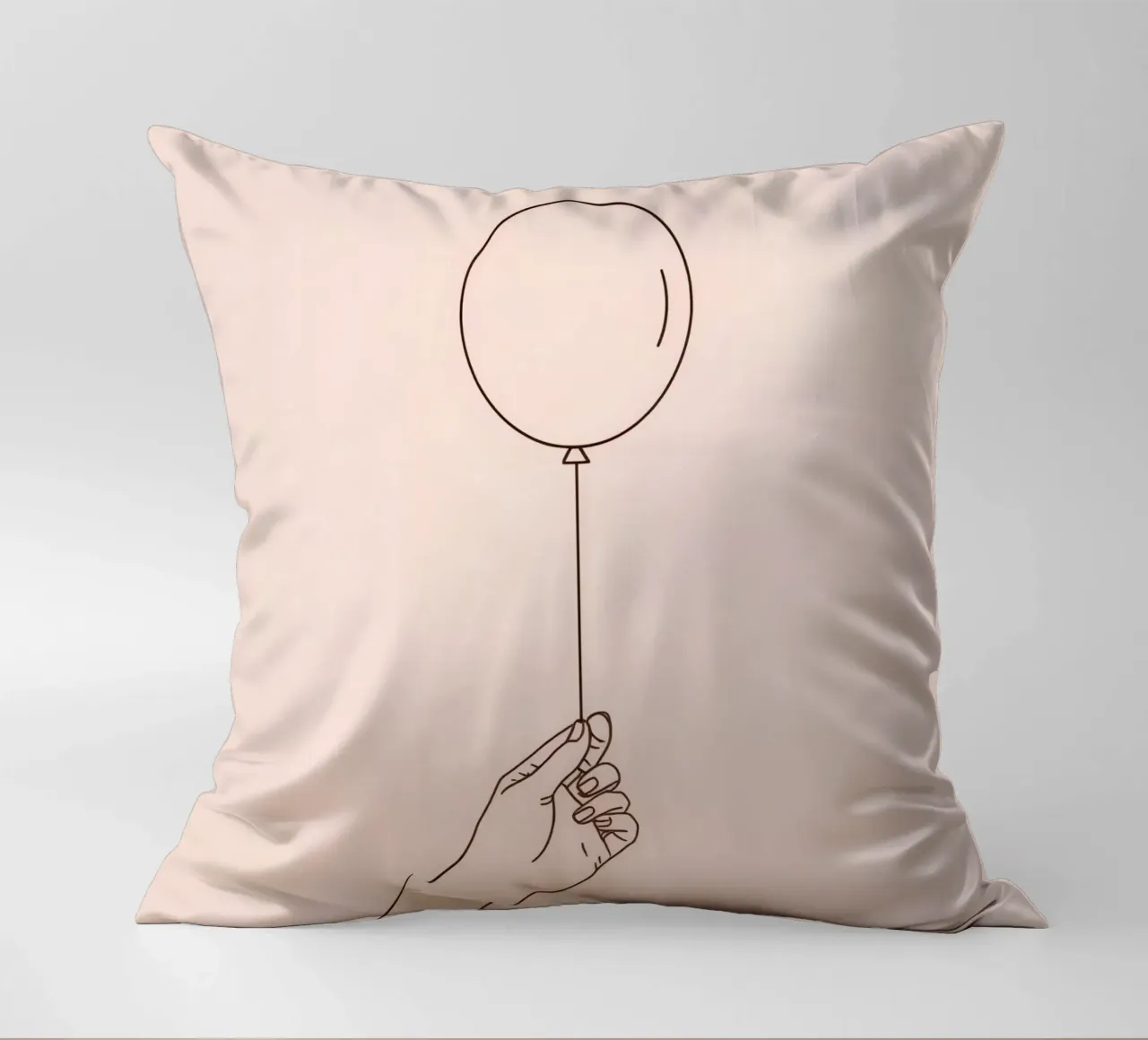 Hand holding single balloon pink pastel art symbolizes joy decorative cushion by DesignDoodle
