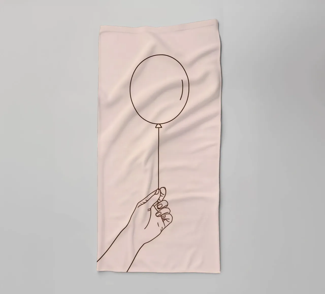 Mano che tiene un palloncino singolo rosa pastello simboleggia la gioia asciugamano da bagno da DesignDoodle