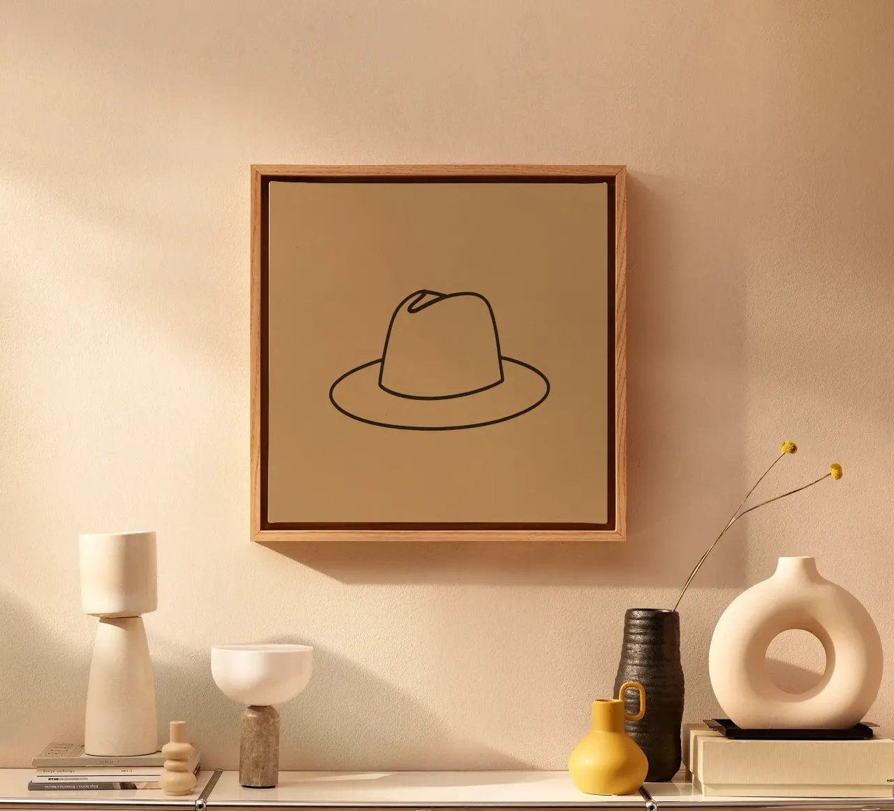 Minimalist line drawing of hat displayed neutral brown art canvas with Floater frame by DesignDoodle