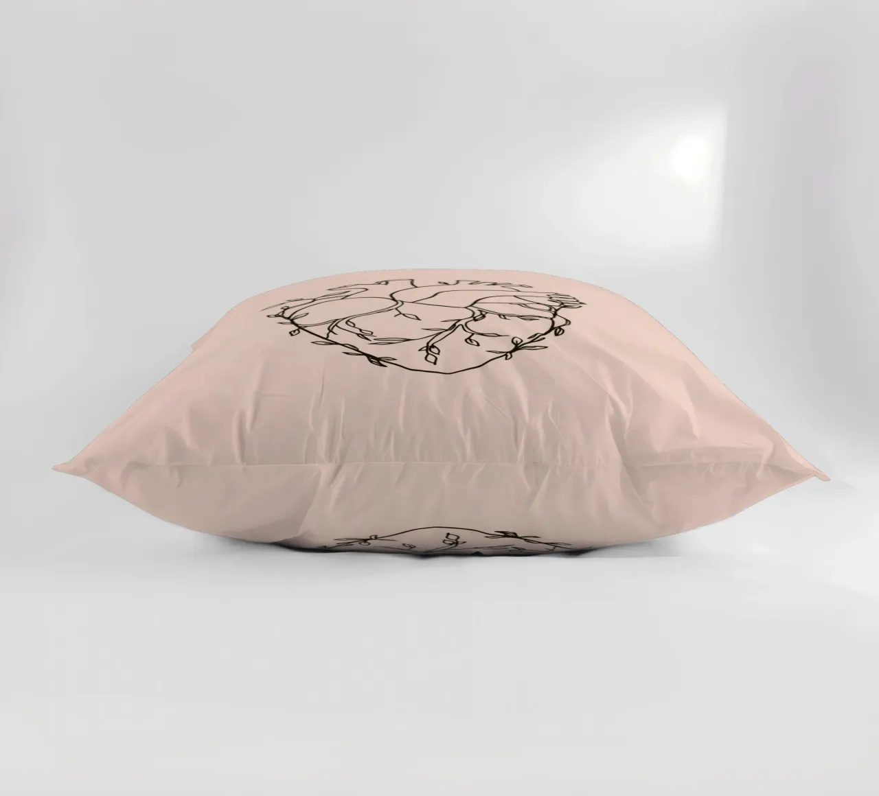 Artistic representation of a heart intertwined with plants decorative cushion by DesignDoodle