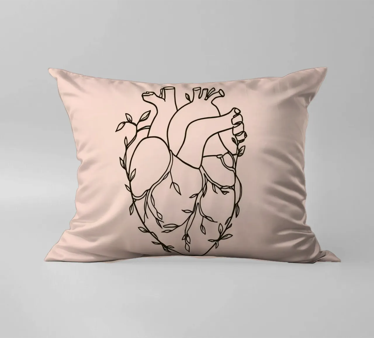 Artistic representation of a heart intertwined with plants decorative cushion by DesignDoodle