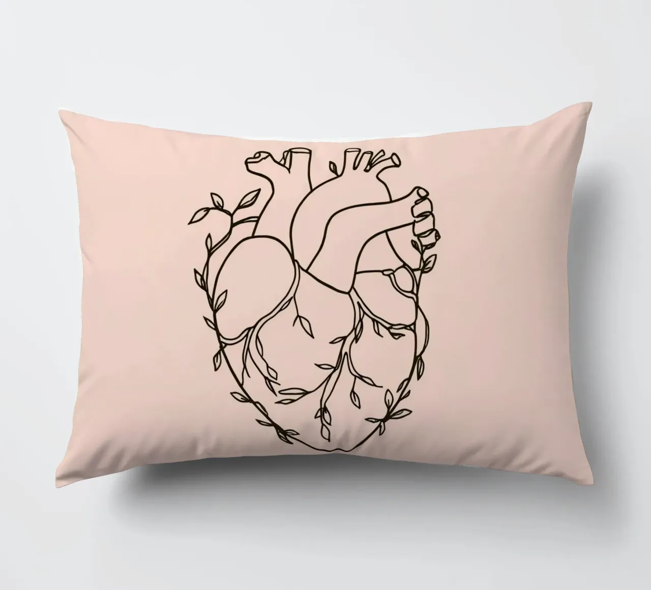 Artistic representation of a heart intertwined with plants decorative cushion by DesignDoodle