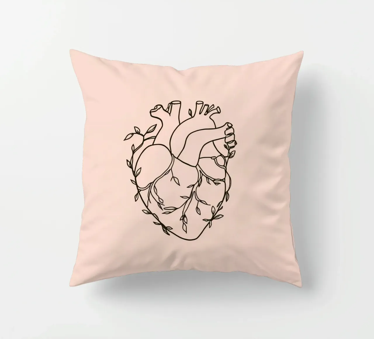 Artistic representation of a heart intertwined with plants decorative cushion by DesignDoodle