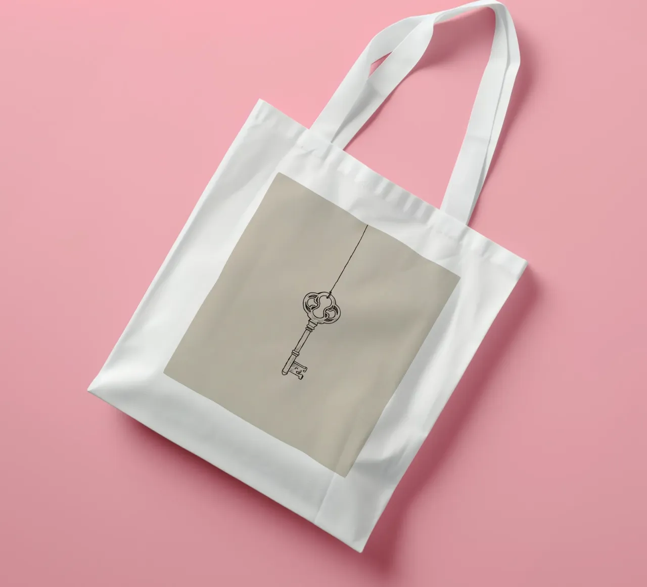 Hanging vintage key against pastel art, classic design tote bag by DesignDoodle