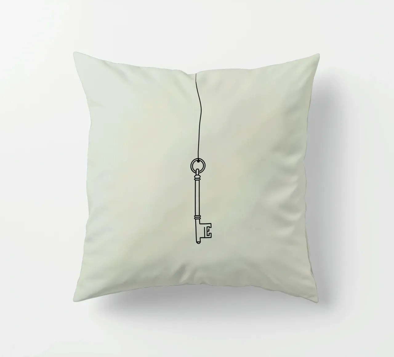 Key hanging from a string against a light backdrop decorative cushion by DesignDoodle