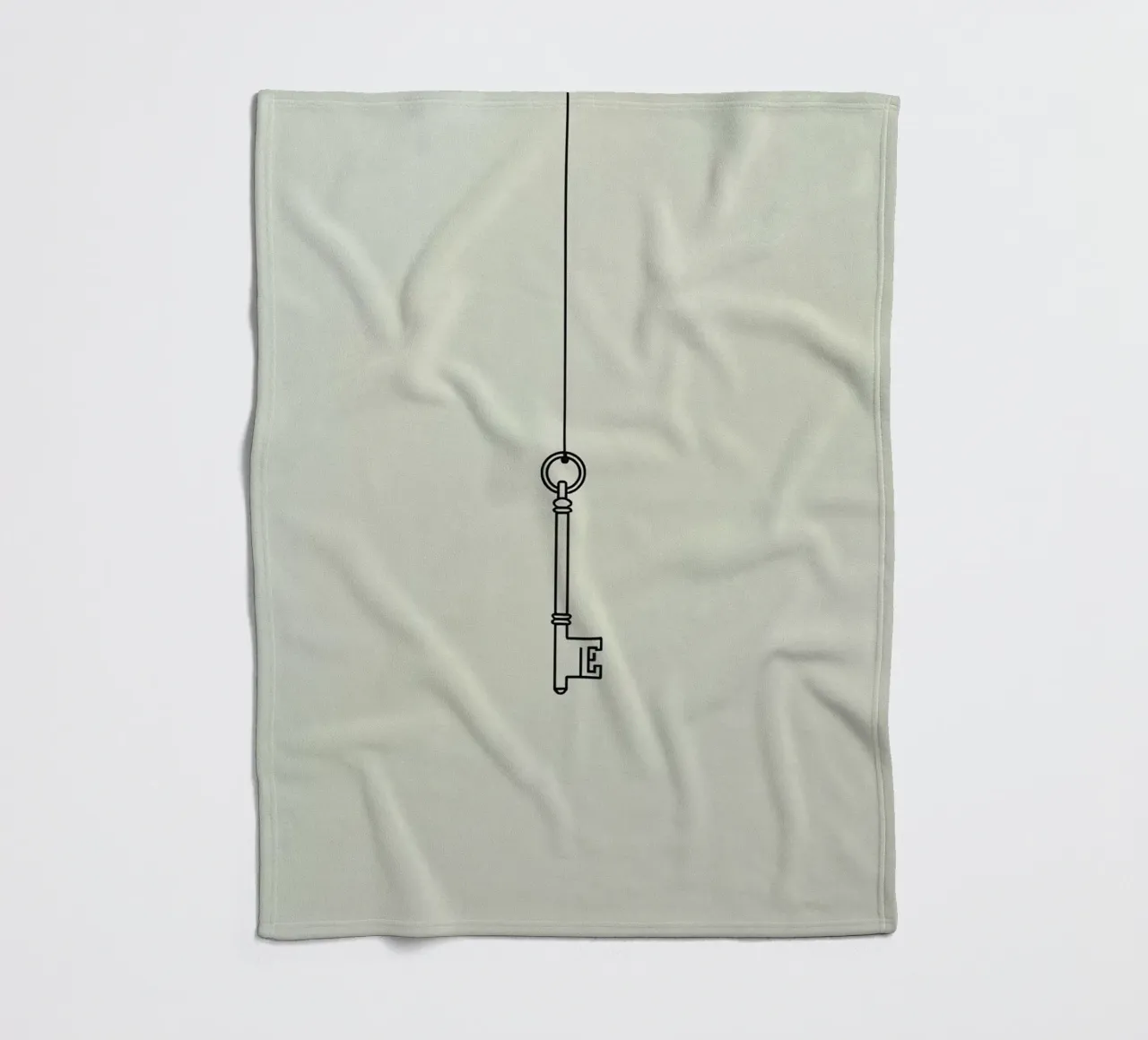 Key hanging from a string against a light backdrop fleece blanket by DesignDoodle