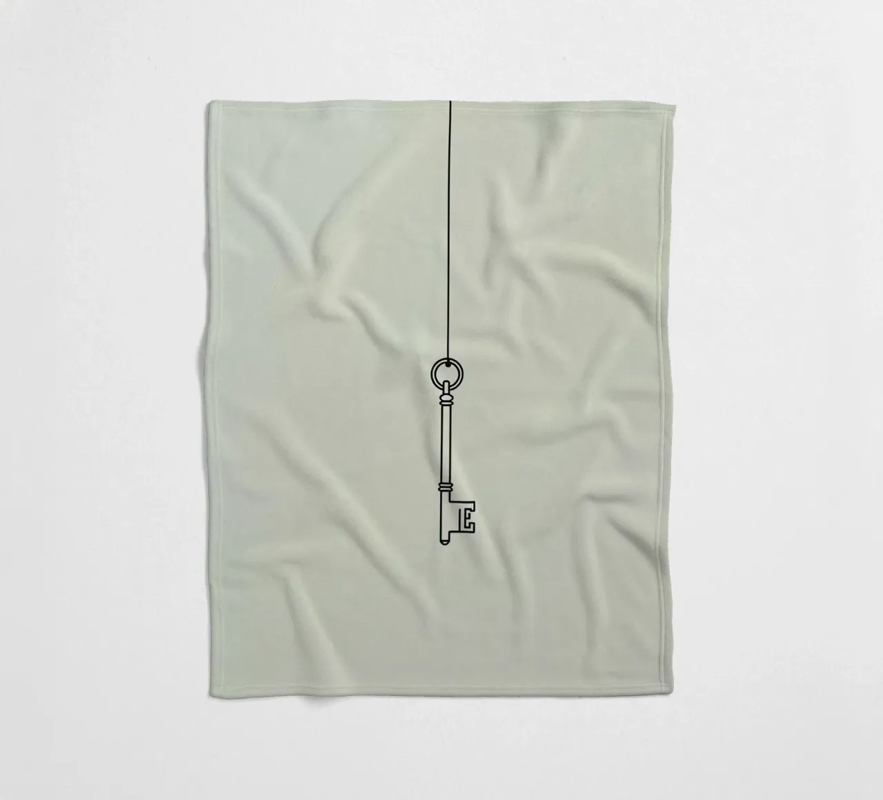 Key hanging from a string against a light backdrop fleece blanket by DesignDoodle