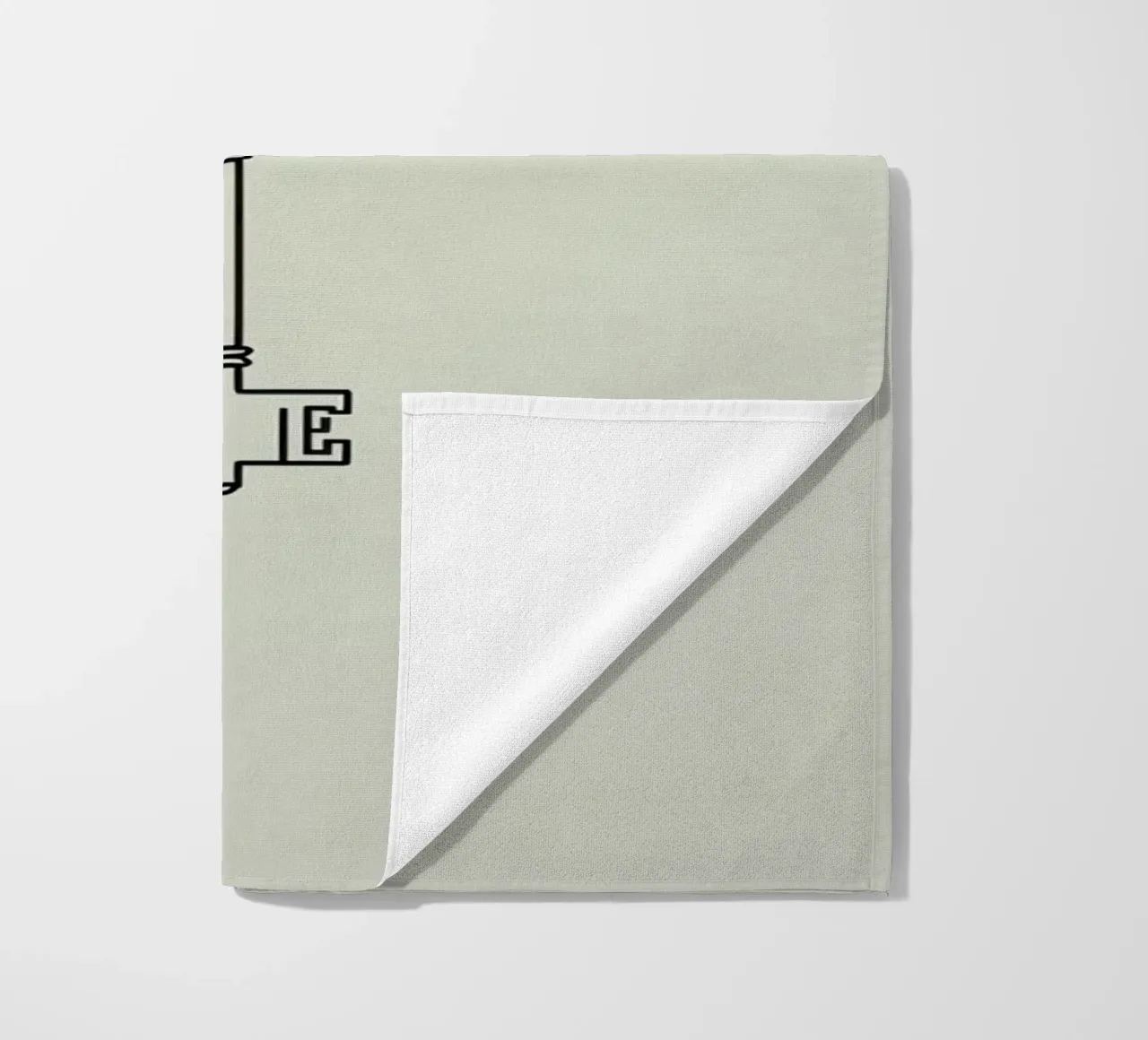 Key hanging from a string against a light backdrop beach towel by DesignDoodle