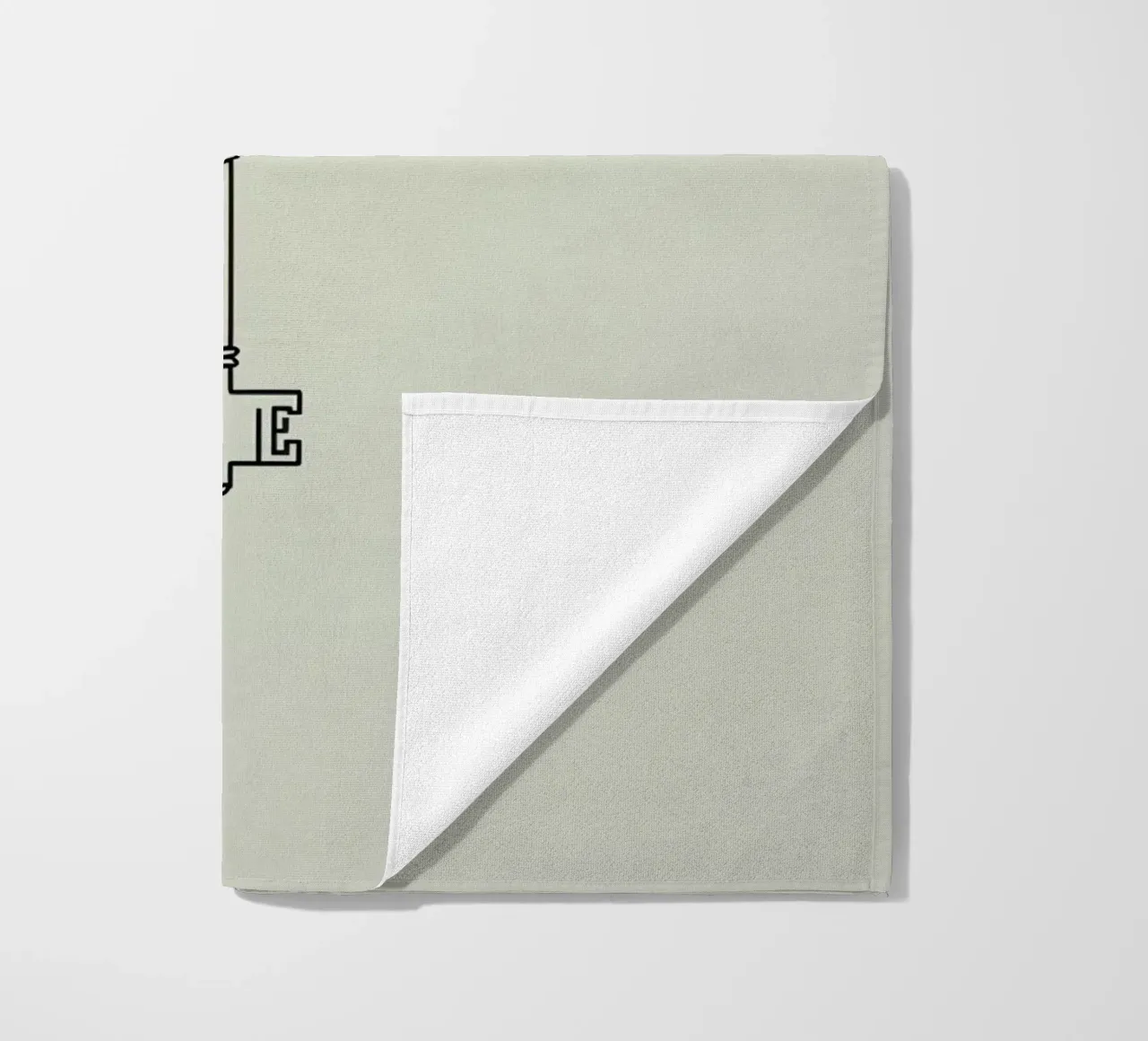 Key hanging from a string against a light backdrop beach towel by DesignDoodle