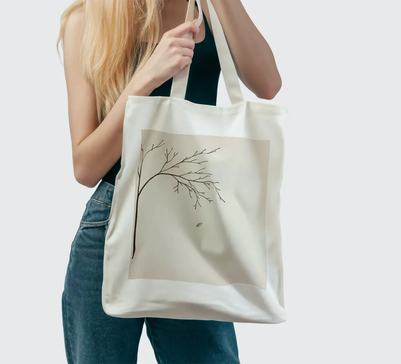 Stylized tree branch with a single leaf falling line art tote bag by DesignDoodle