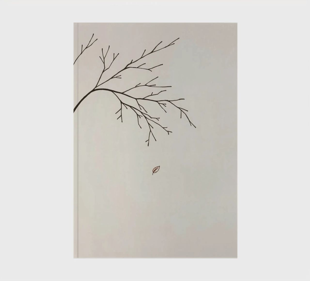 Stylized tree branch with a single leaf falling line art notebook by DesignDoodle