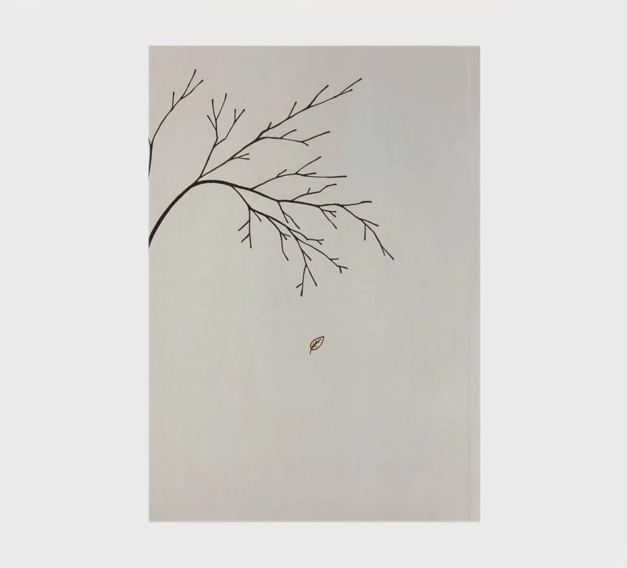 Stylized tree branch with a single leaf falling line art notebook by DesignDoodle