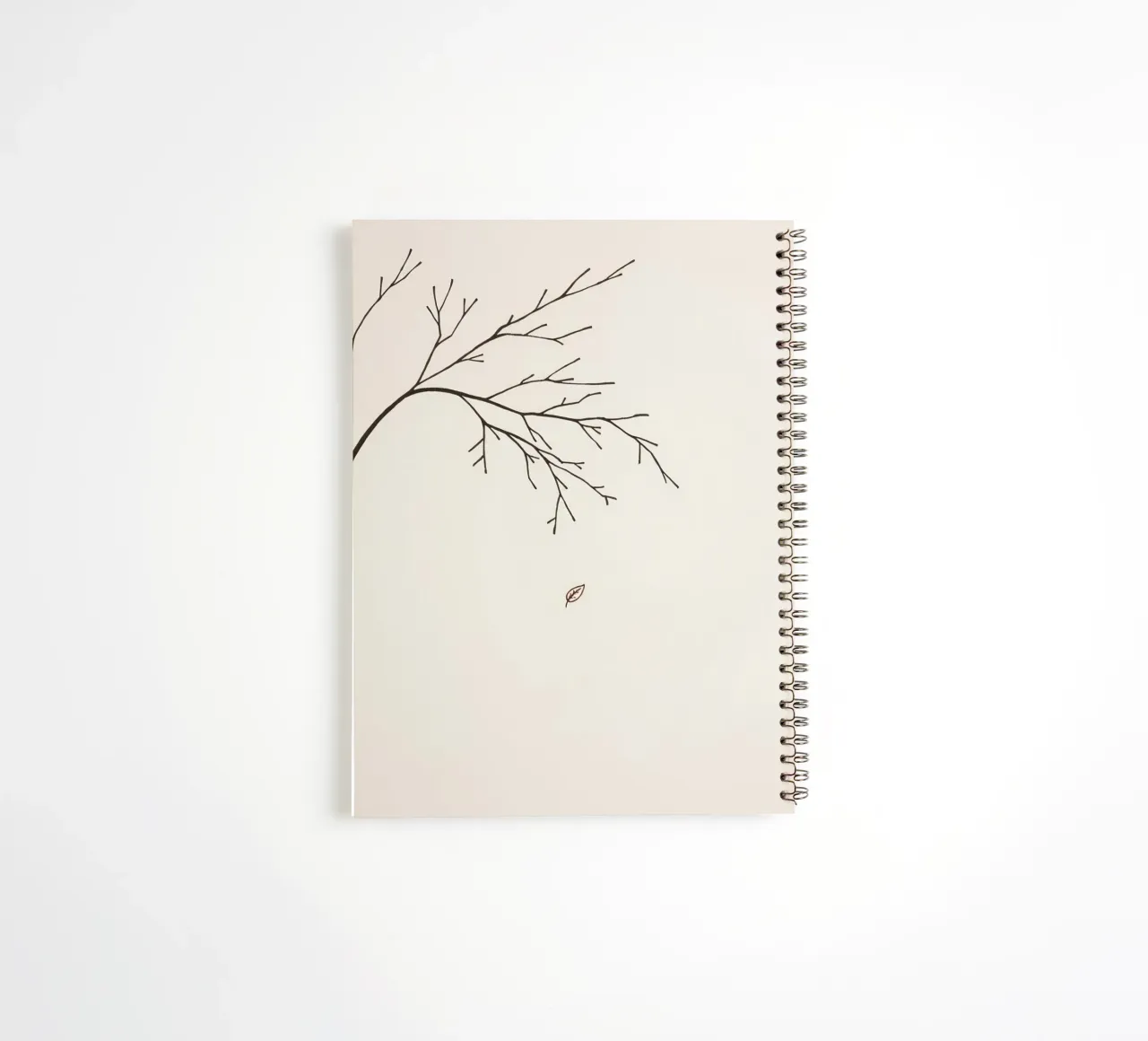 Stylized tree branch with a single leaf falling line art spiral notebook by DesignDoodle