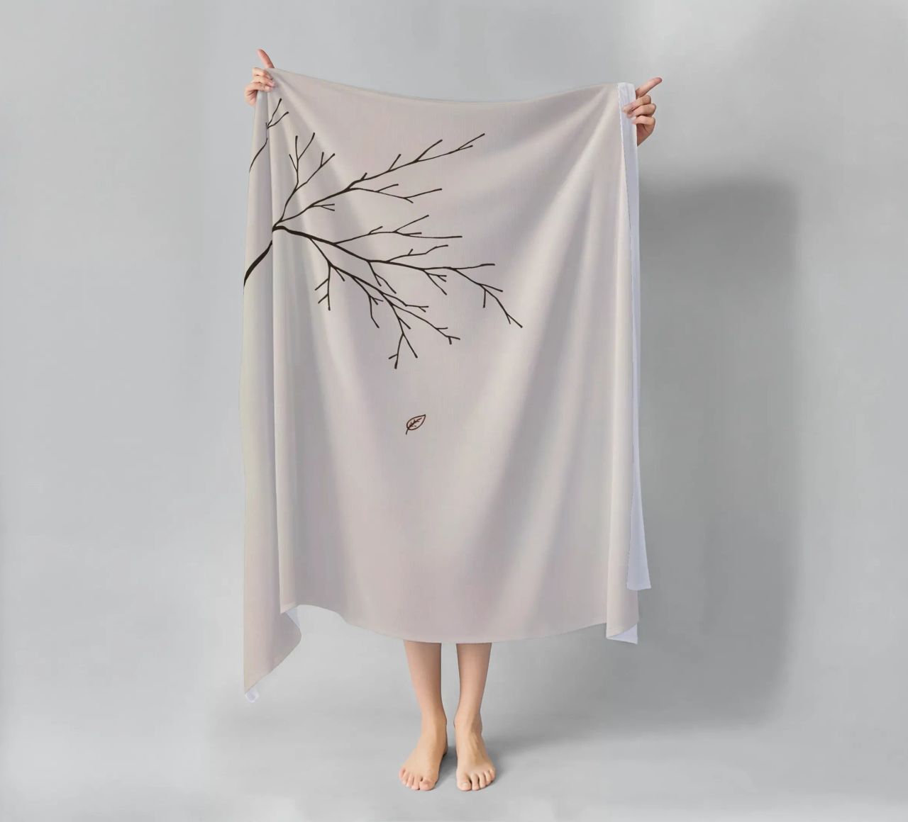 Stylized tree branch with a single leaf falling line art beach towel by DesignDoodle