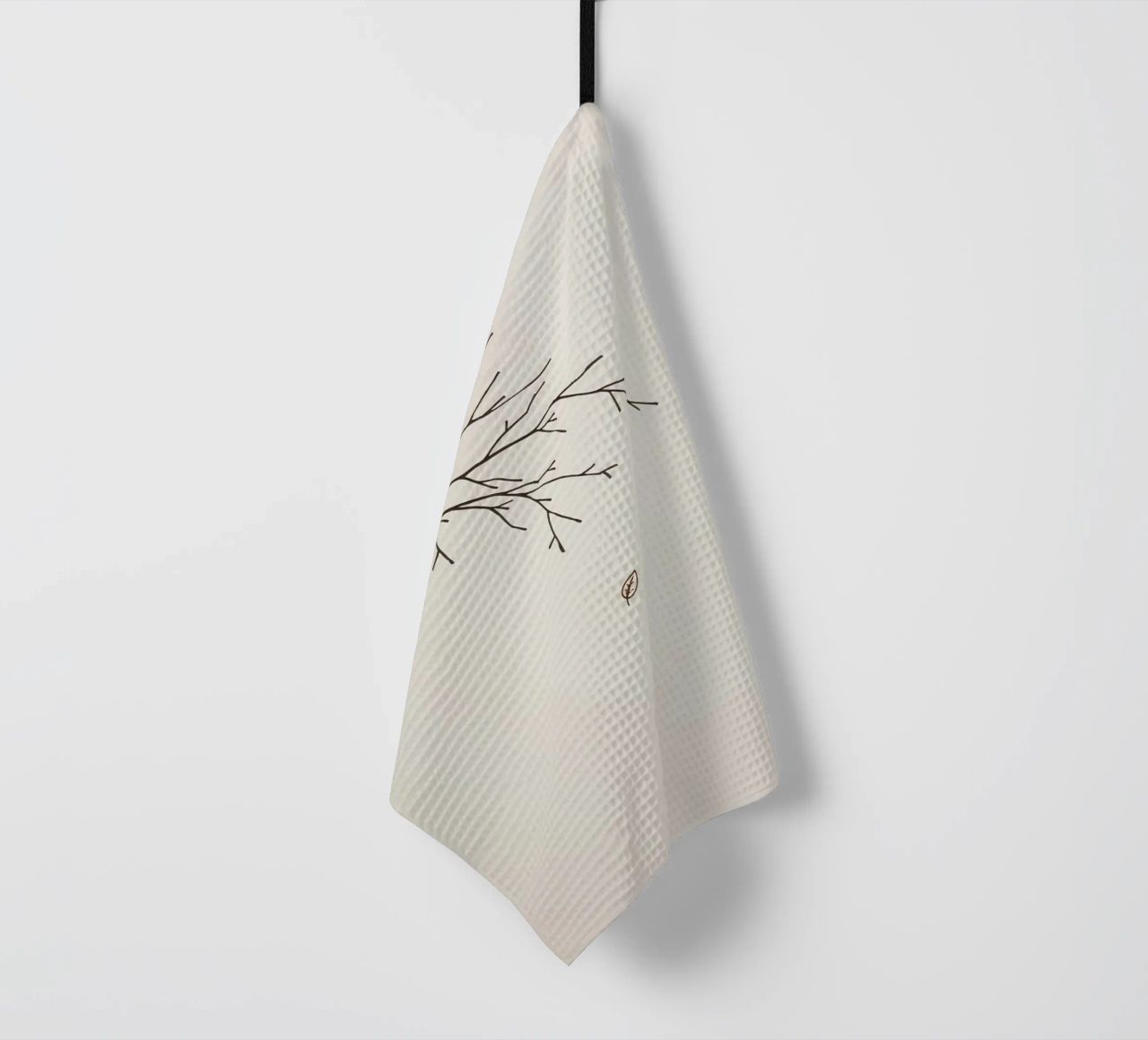 Stylized tree branch with a single leaf falling line art tea towel by DesignDoodle