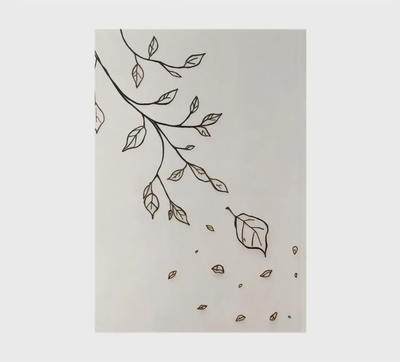 Leaves falling from a branch in a minimalistic artistic art notebook by DesignDoodle