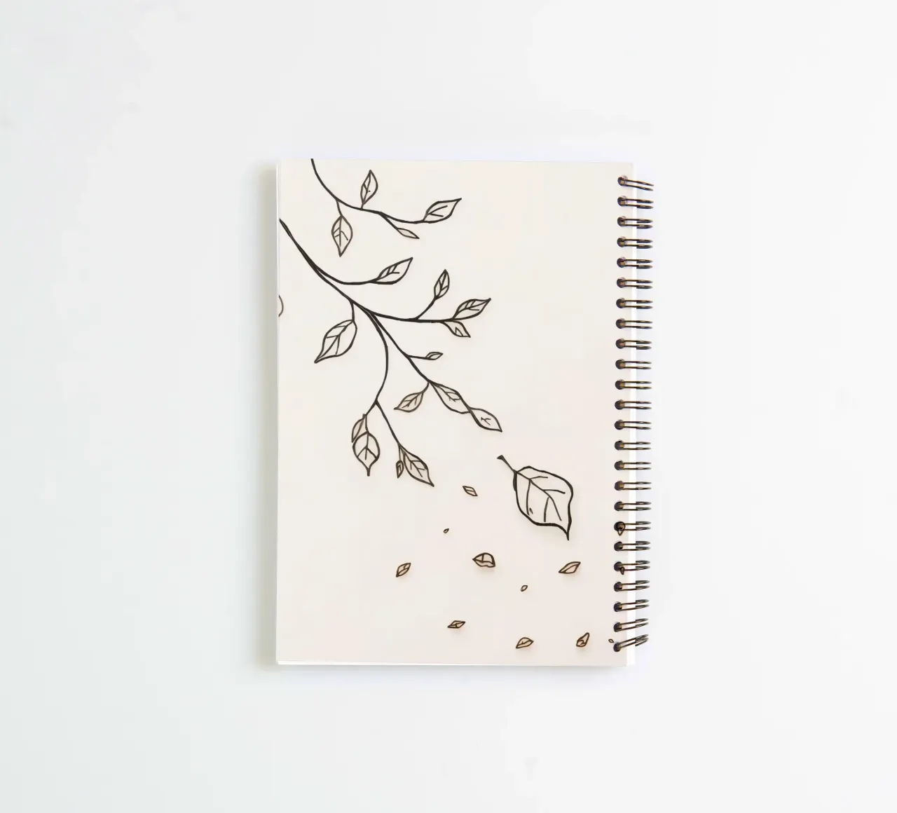 Leaves falling from a branch in a minimalistic artistic art spiral notebook by DesignDoodle