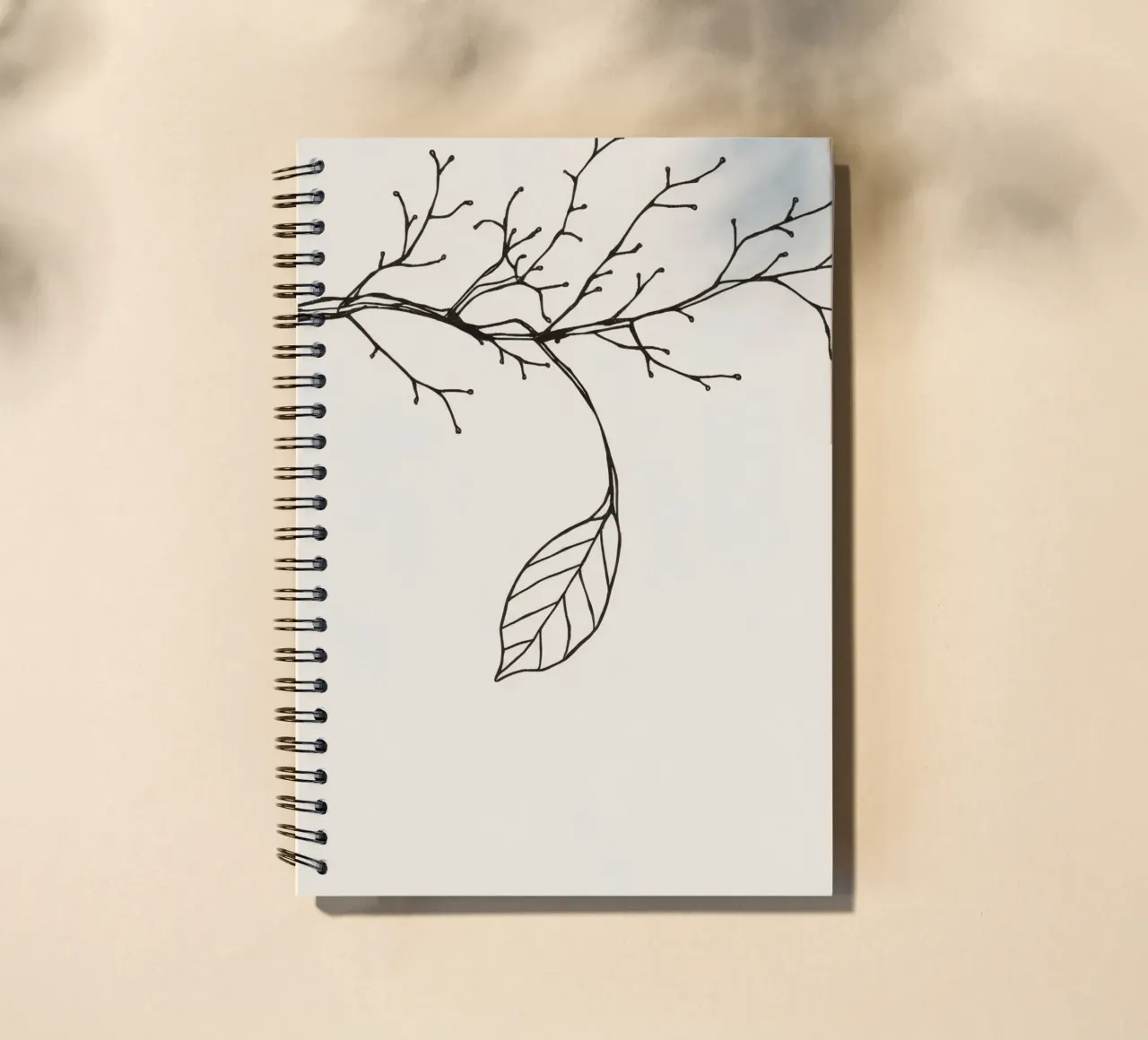 Intricately drawn branch with delicate twigs & single leafe spiral notebook by DesignDoodle