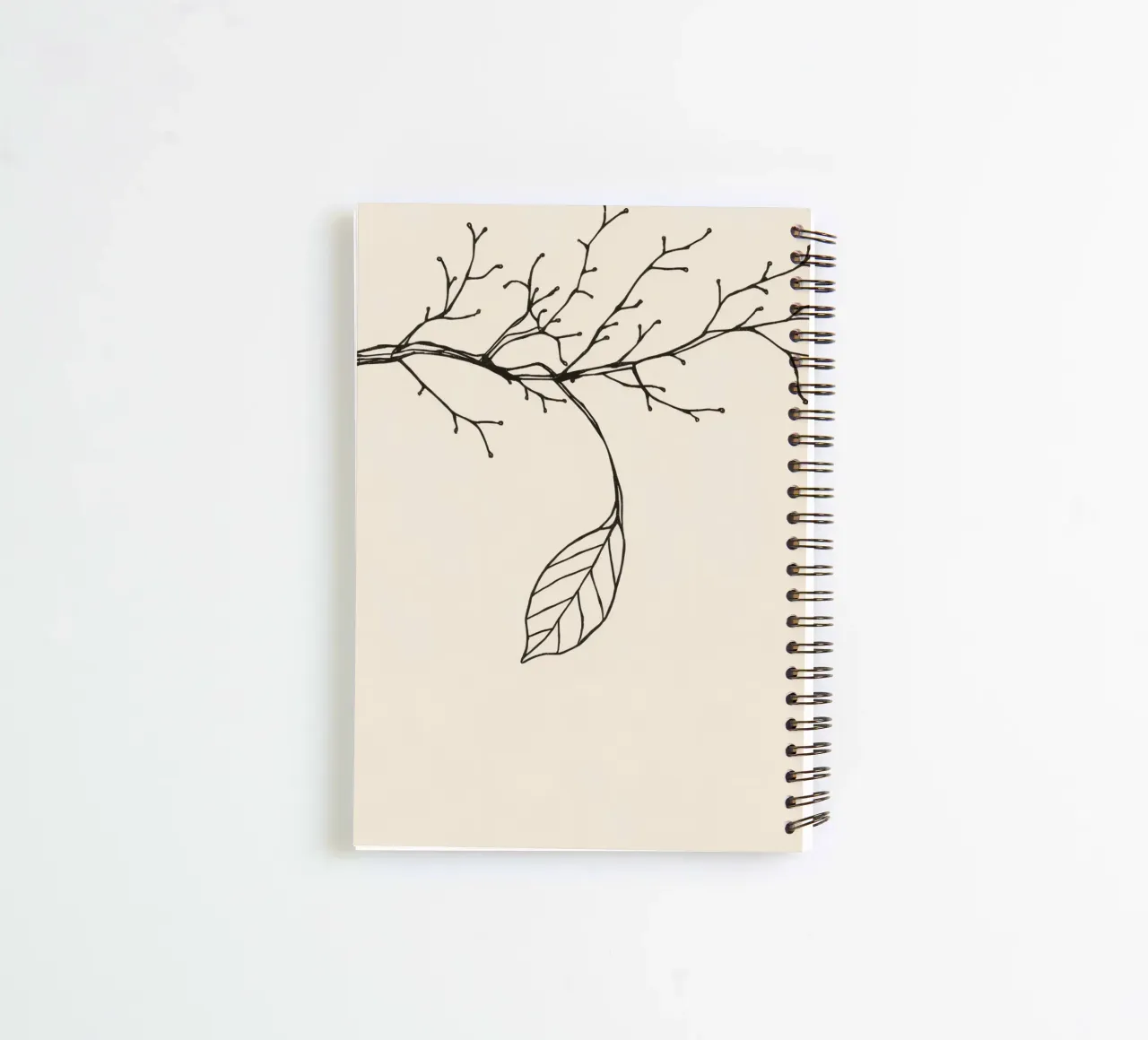Intricately drawn branch with delicate twigs & single leafe spiral notebook by DesignDoodle