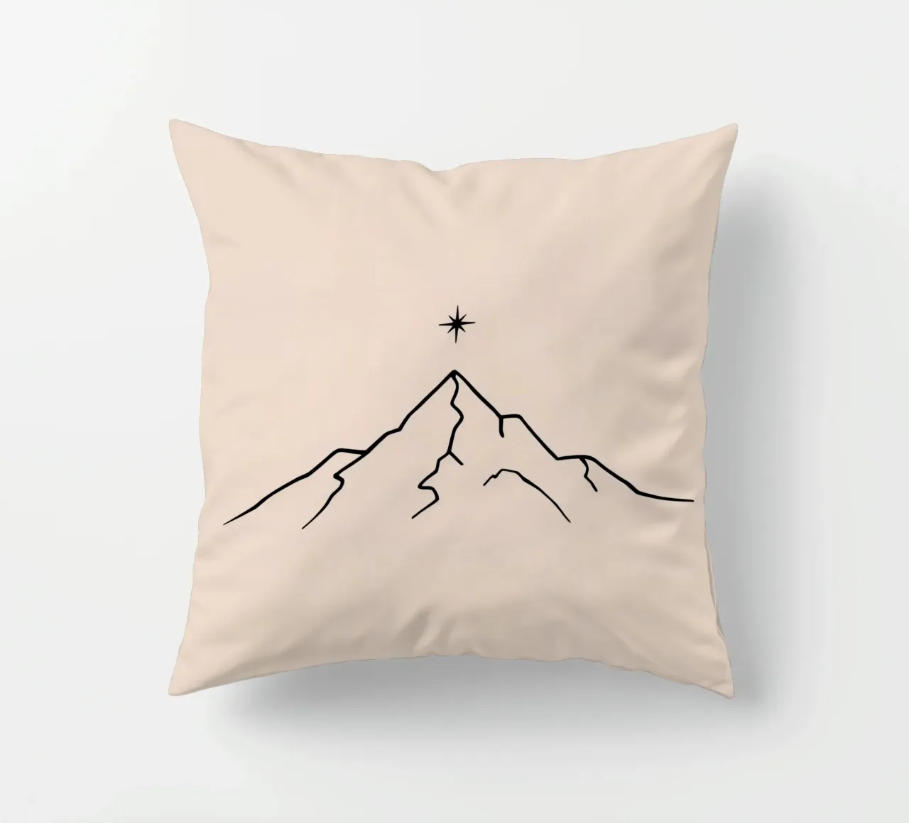 Mountain peak with a star above in a minimalist design decorative cushion by DesignDoodle