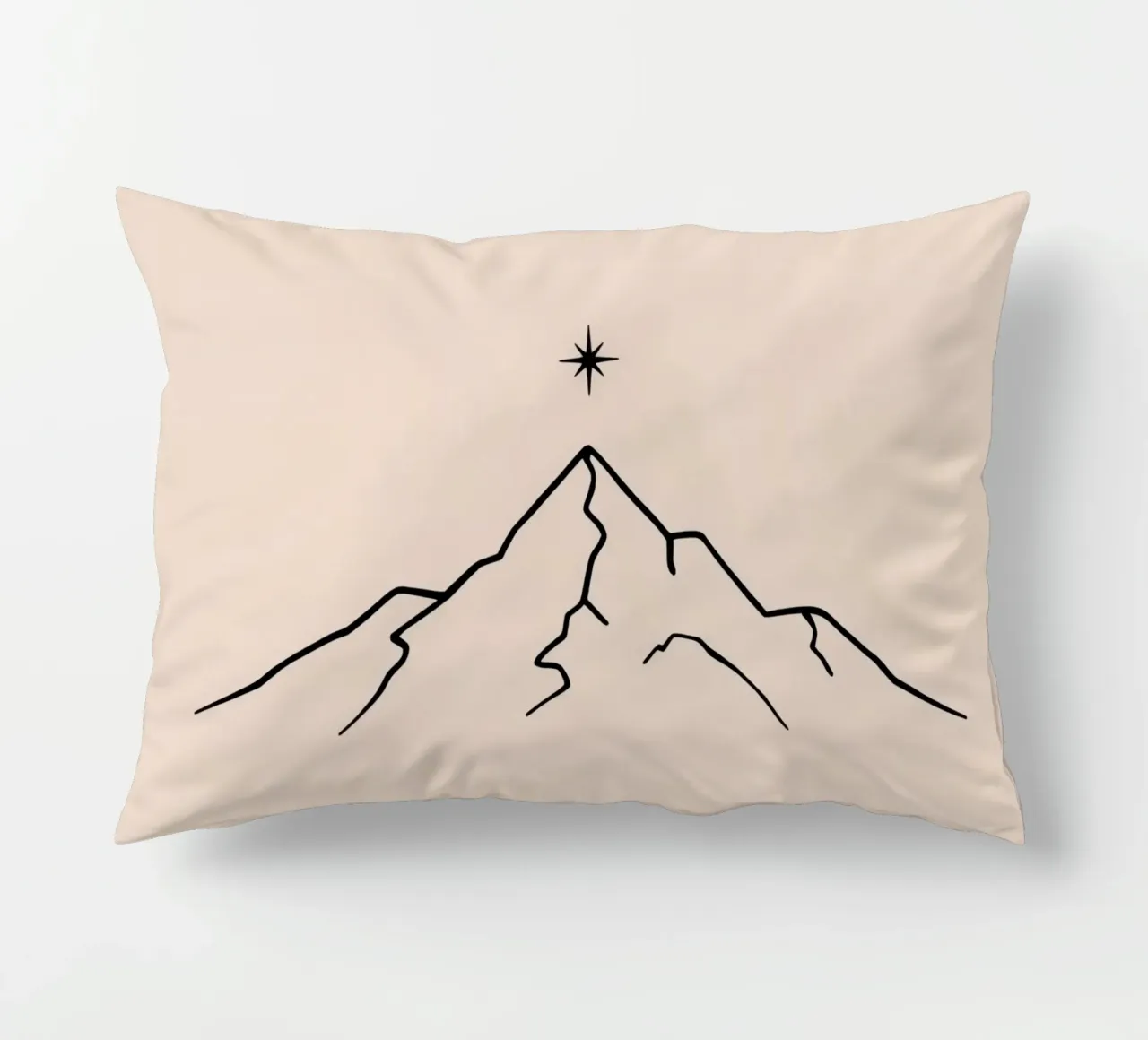 Mountain peak with a star above in a minimalist design decorative cushion by DesignDoodle