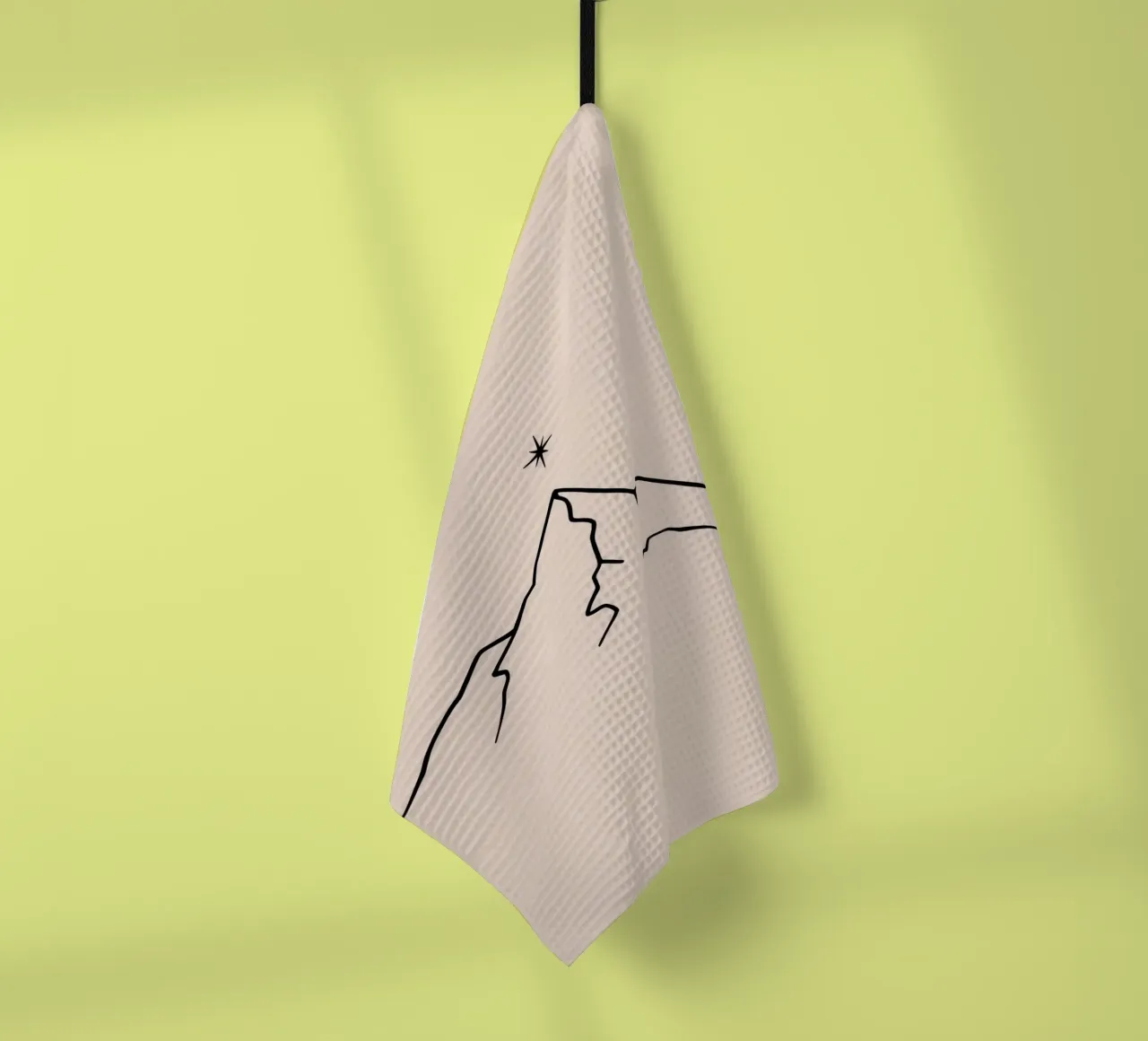 Mountain peak with a star above in a minimalist design tea towel by DesignDoodle