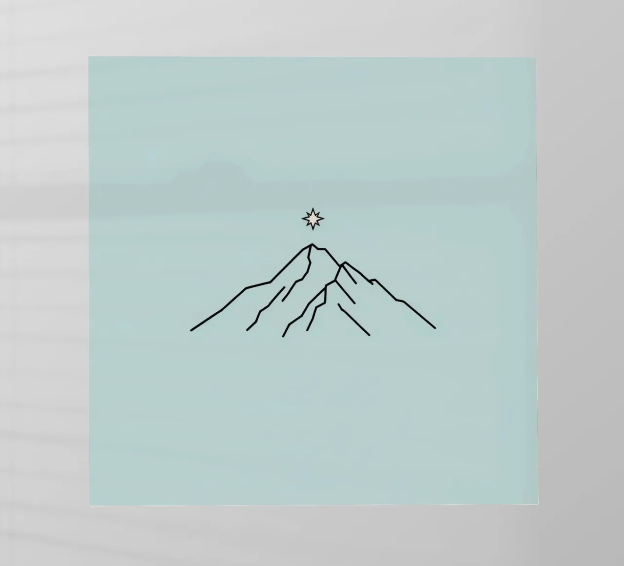 Sagoma di montagna con stella sovrastante su sfondo azzurro pellicola backlit da DesignDoodle