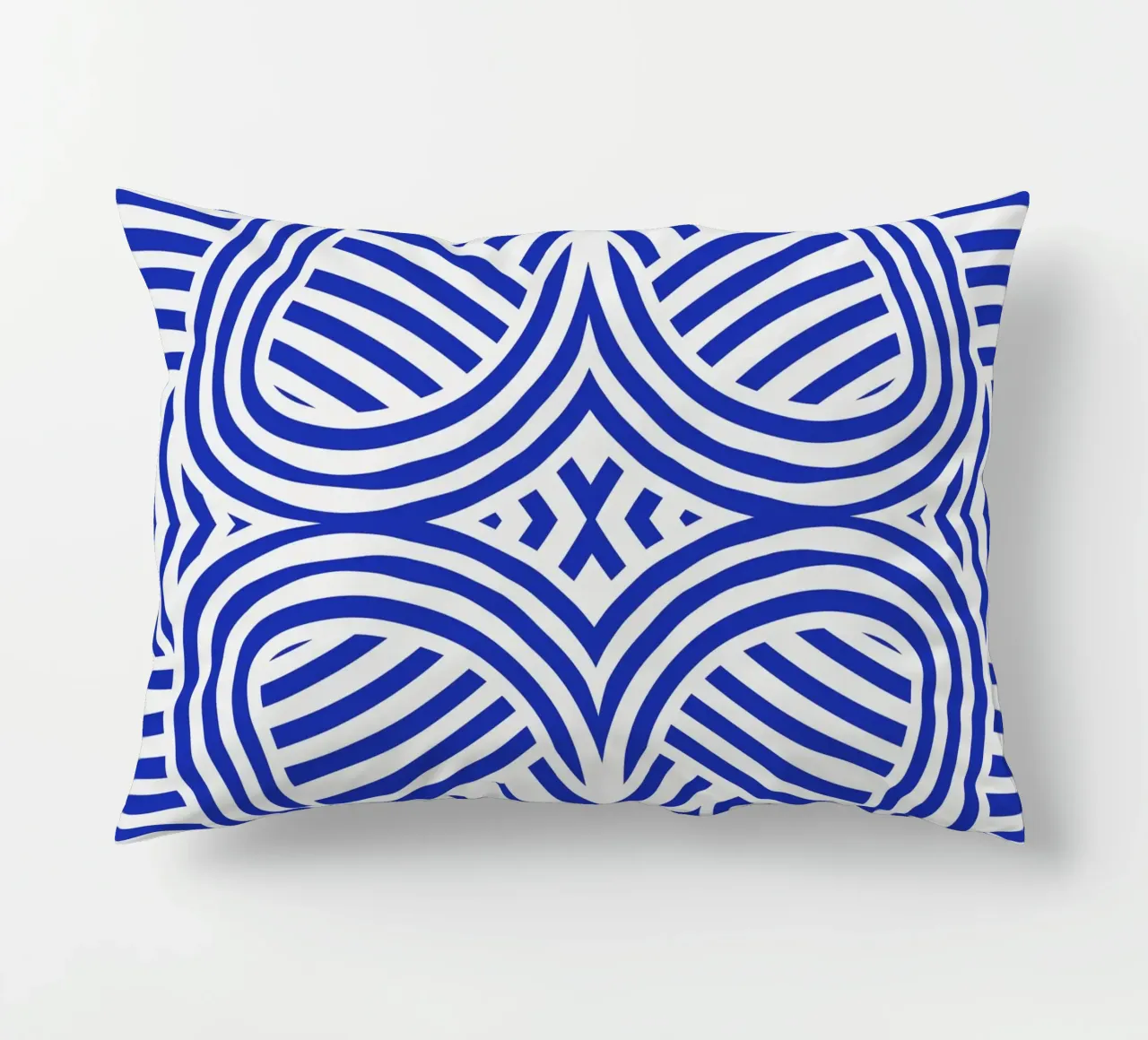 Symmetrical ultramarine and white pattern decorative cushion by Little Dean