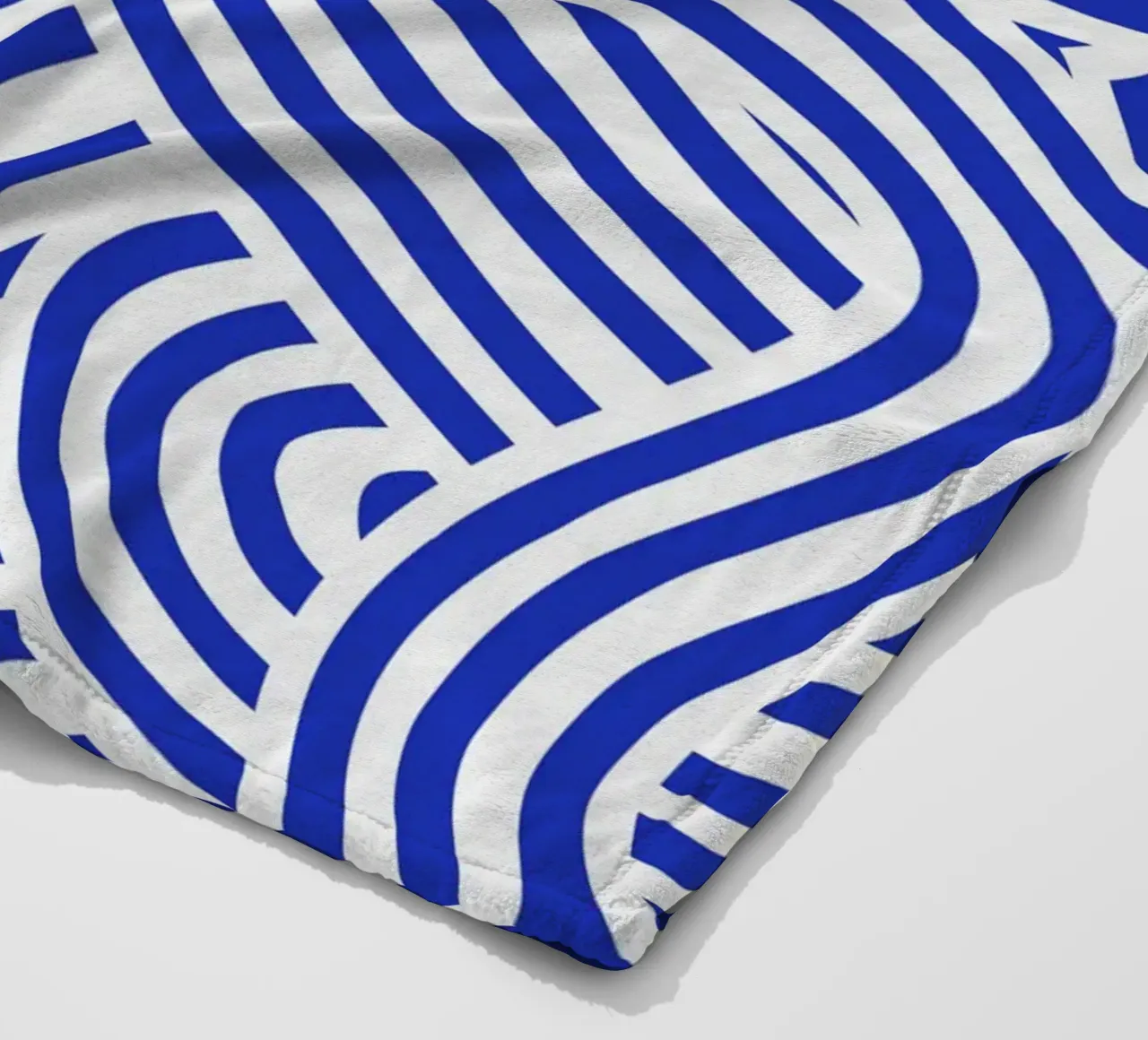 Symmetrical ultramarine and white pattern fleece blanket by Little Dean