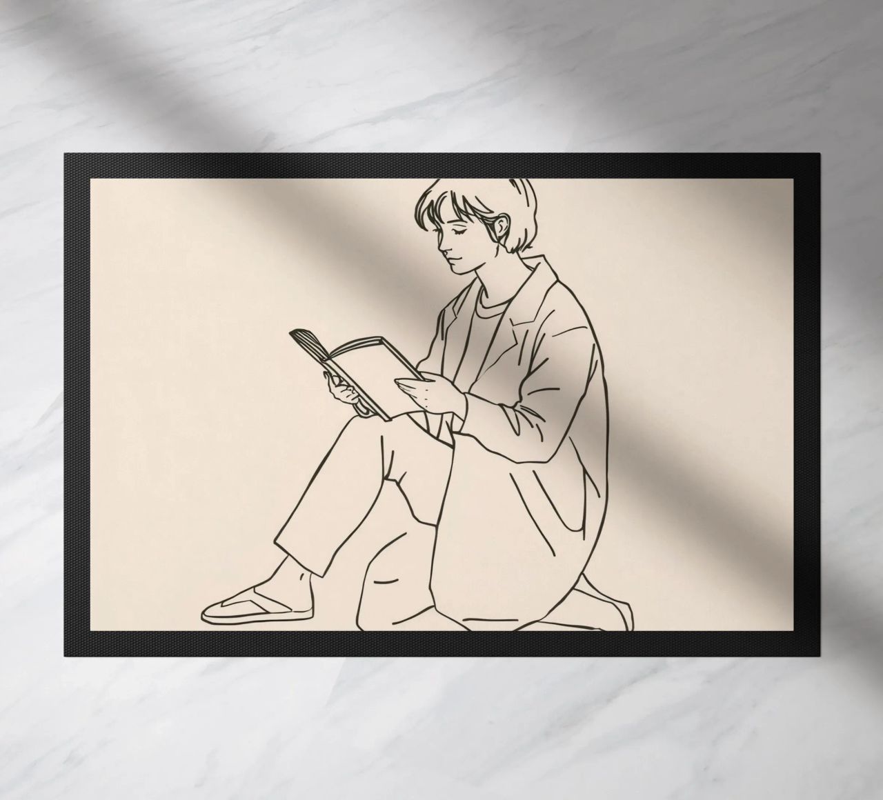 Persona che legge un libro seduta a terra in un ambiente informale zerbino da DesignDoodle