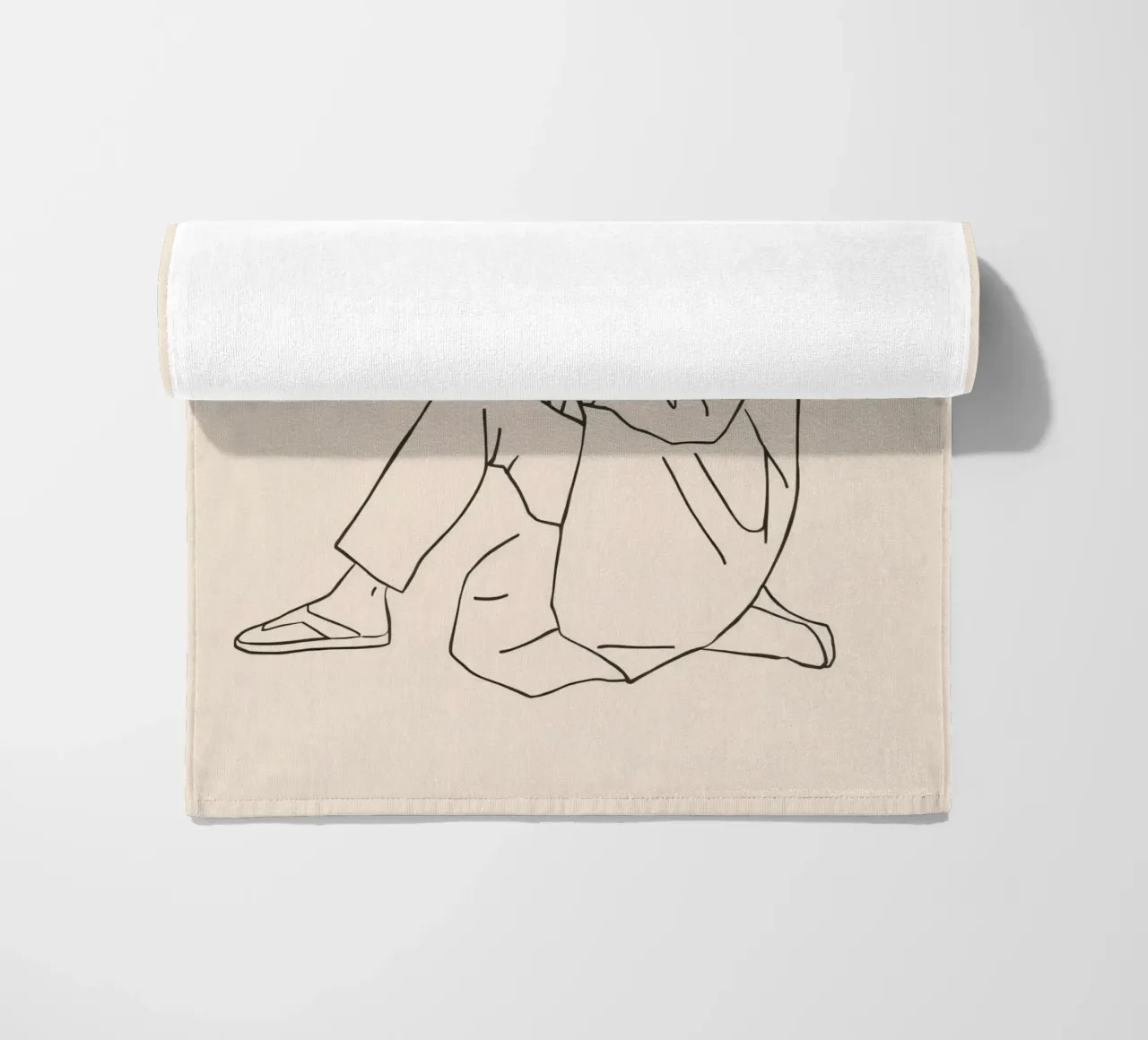 Person reading a book while sitting on the floor in a casual beach towel by DesignDoodle