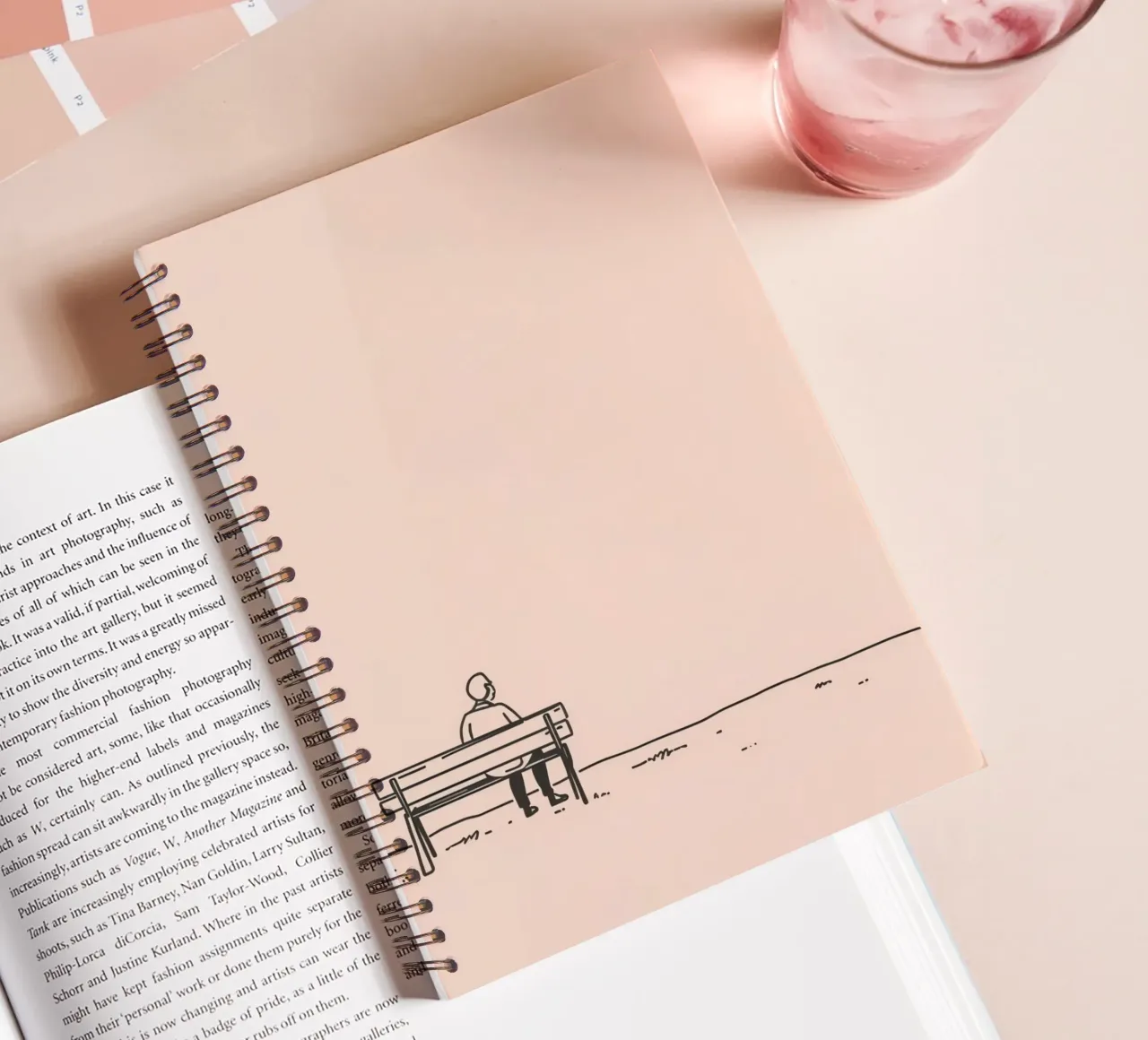 Man sitting on a bench contemplating life spiral notebook by DesignDoodle