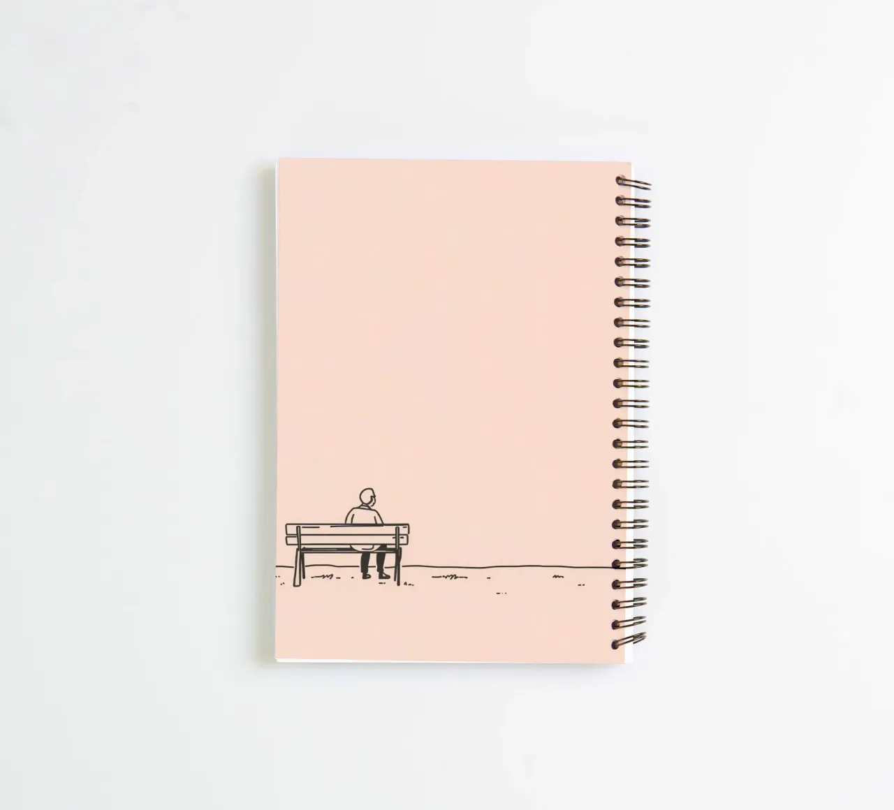 Man sitting on a bench contemplating life spiral notebook by DesignDoodle
