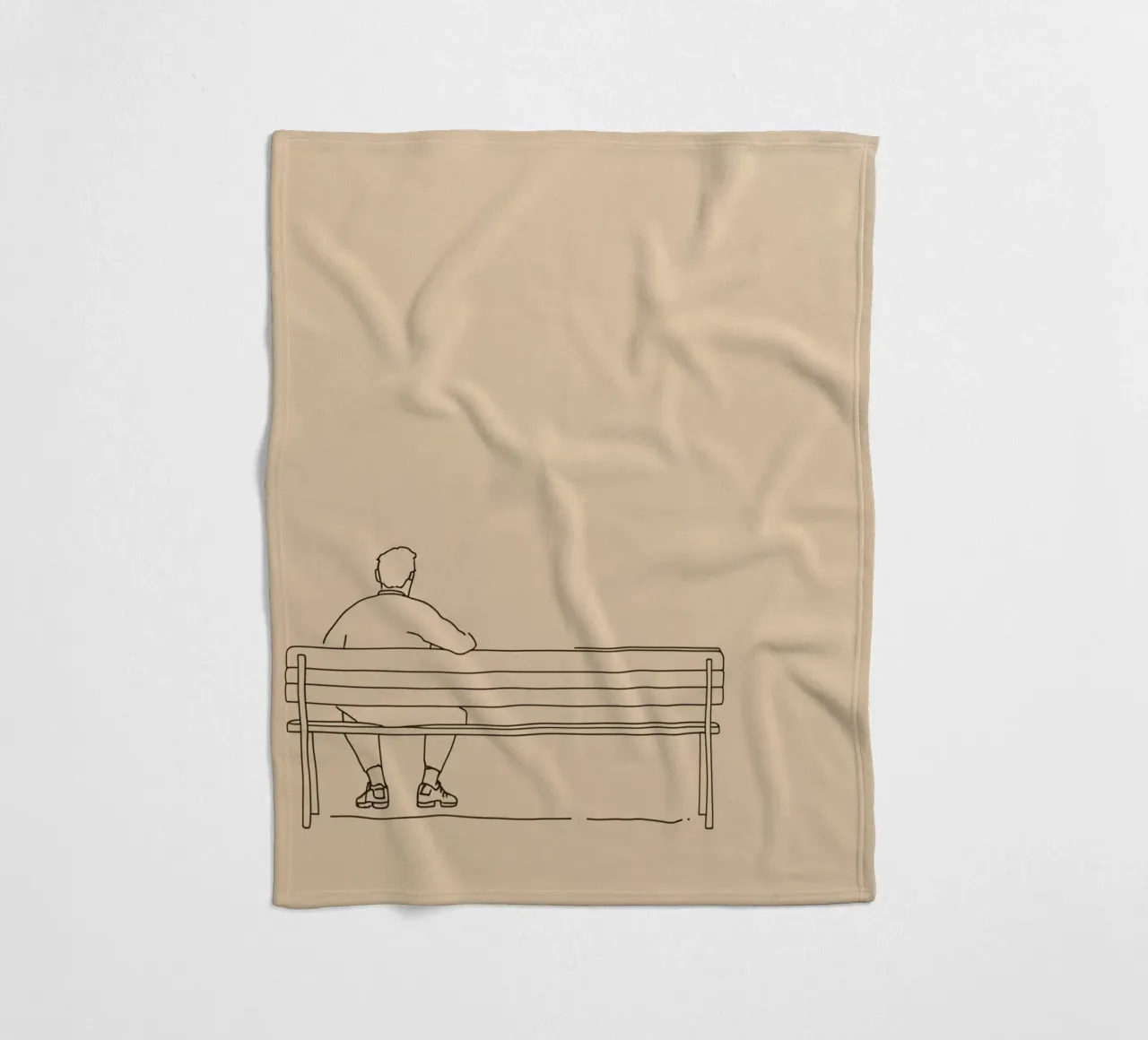 Individual sitting quietly on a bench in a minimalist art fleece blanket by DesignDoodle