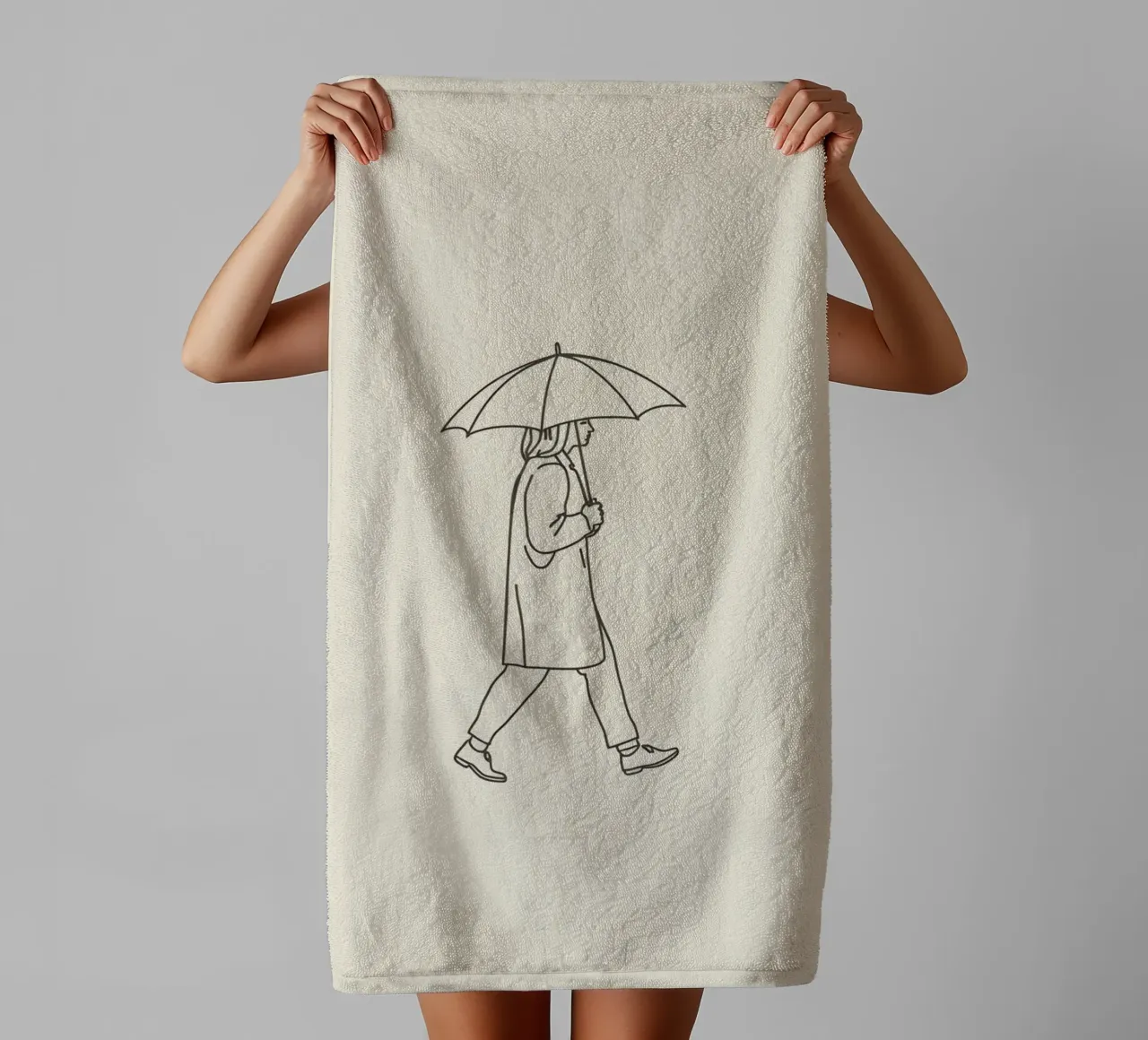 Person walking with umbrella in light rain on a neutral art towel by DesignDoodle