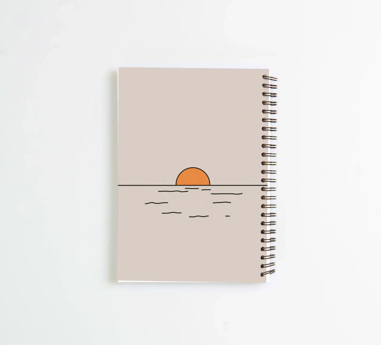 Sunset over calm waters creates a picturesque horizon line spiral notebook by DesignDoodle