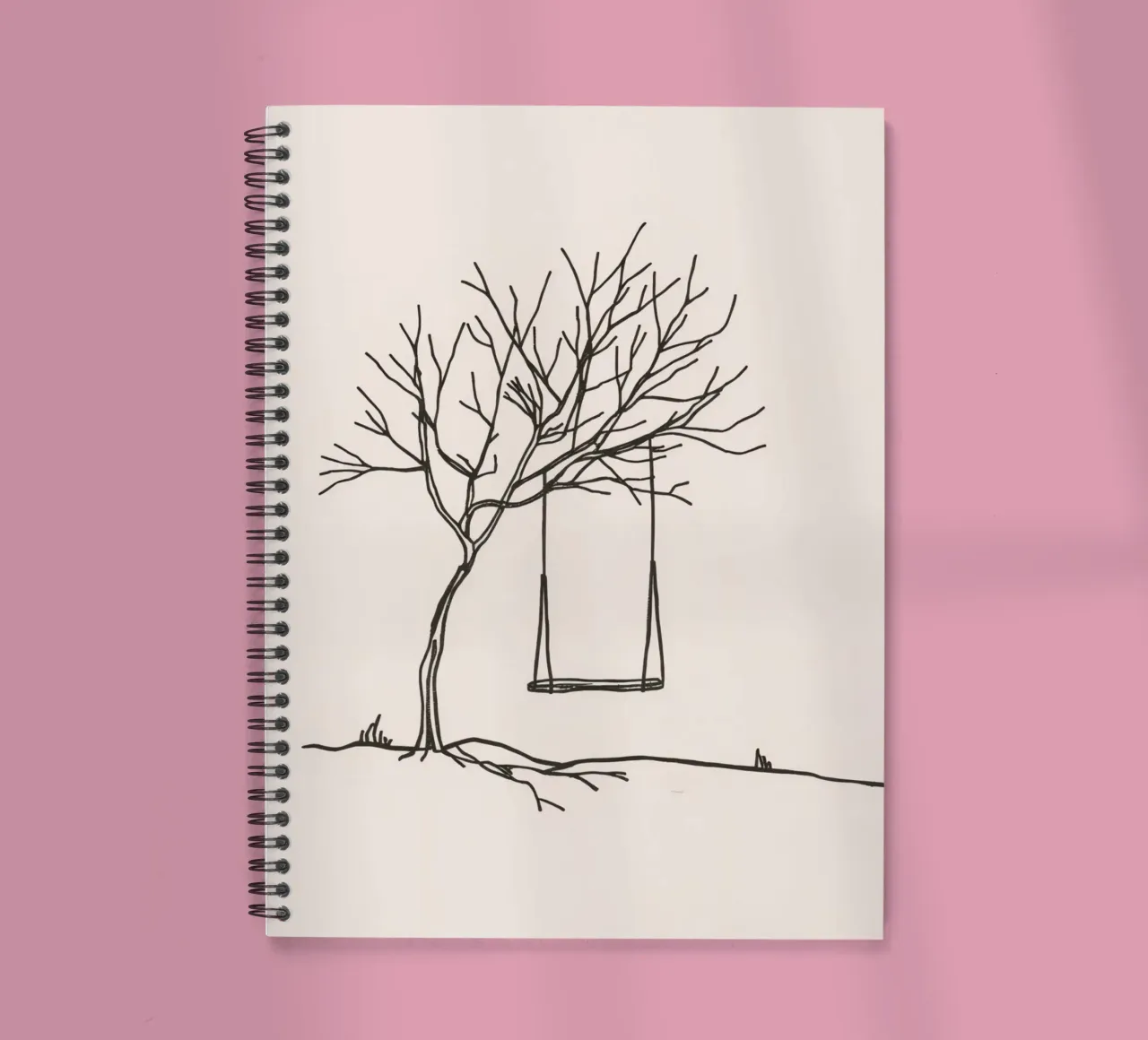 Swing hanging from a bare tree in a quiet landscape spiral notebook by DesignDoodle