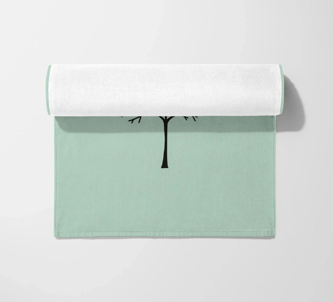 Minimalist tree design with intricate branch patterns beach towel by DesignDoodle