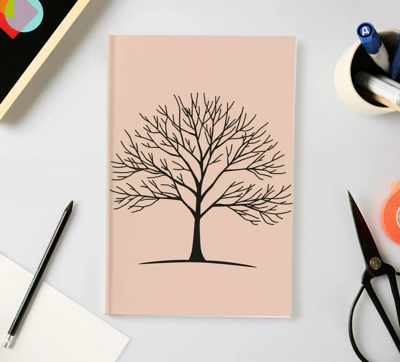 Bare tree with intricate branches against a pale background notebook by DesignDoodle