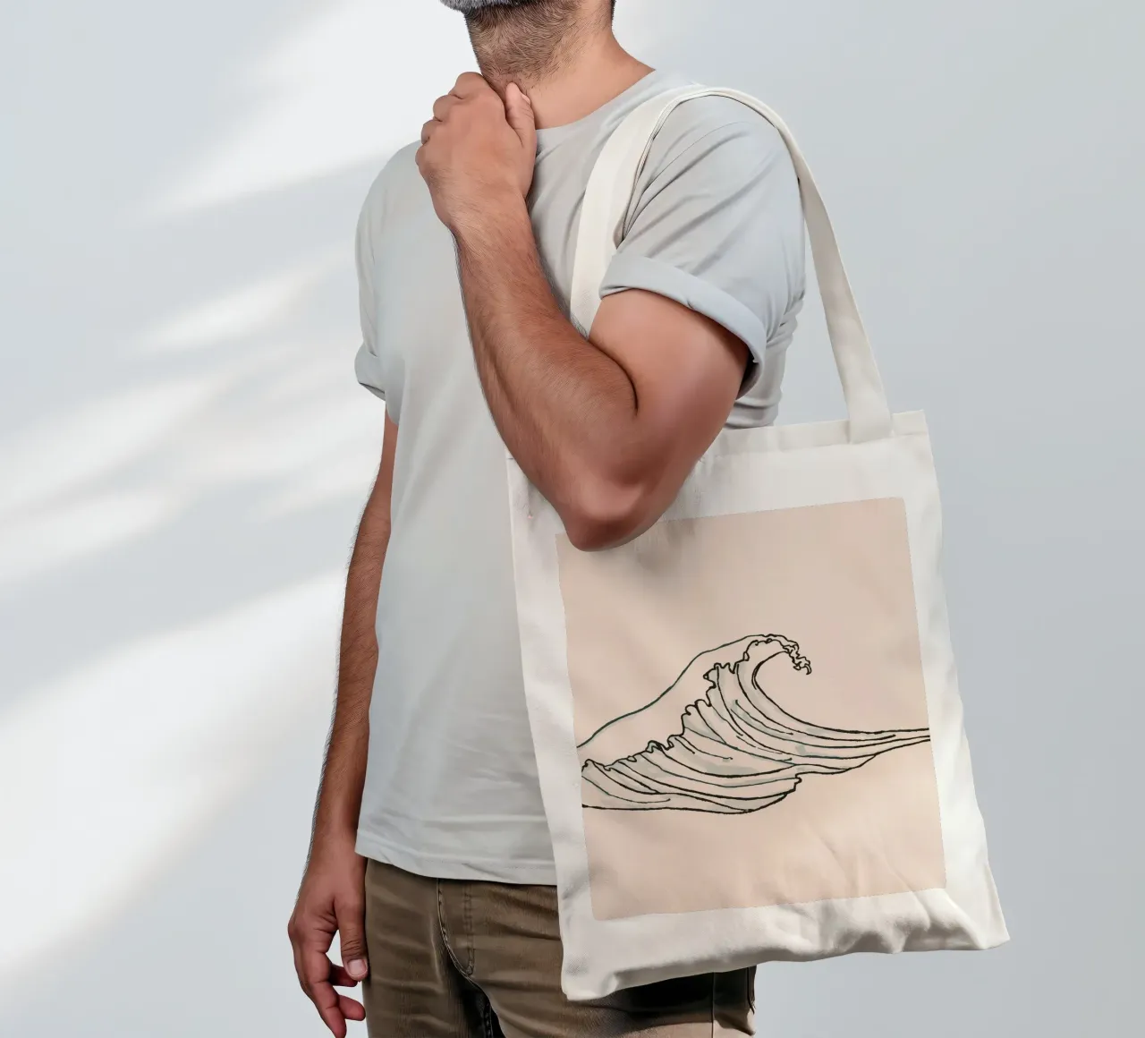 Stunning illustration of a powerful ocean wave curling tote bag by DesignDoodle