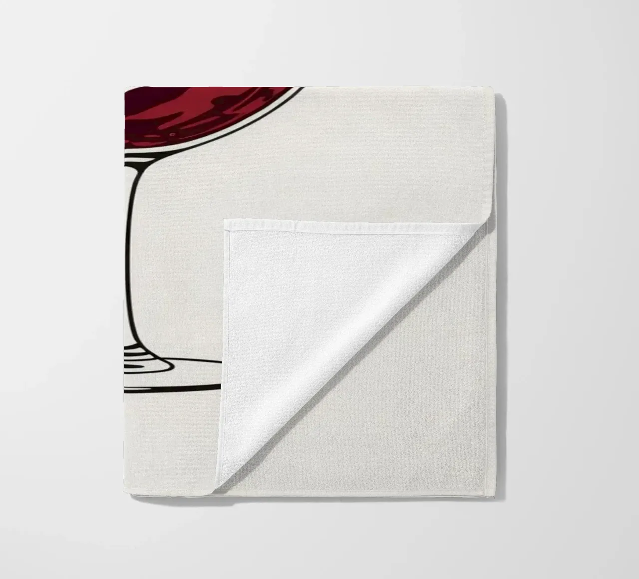 Red wine being poured into a glass with splashes captured beach towel by DesignDoodle