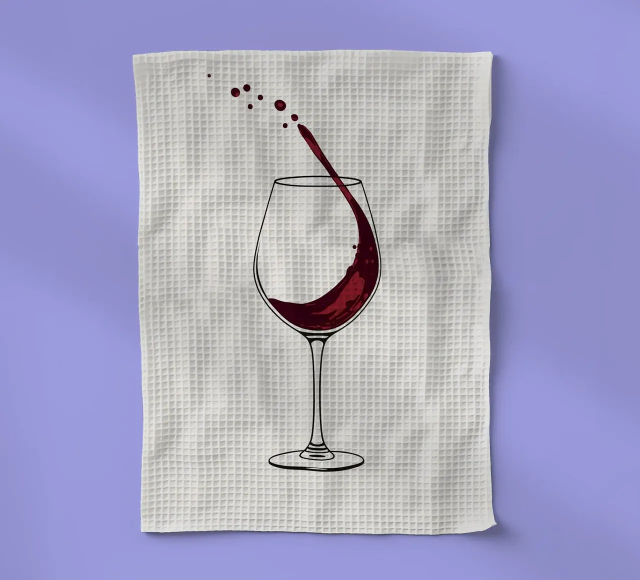 Vino tinto vertido en un vaso con salpicaduras capturadas paño de cocina de DesignDoodle